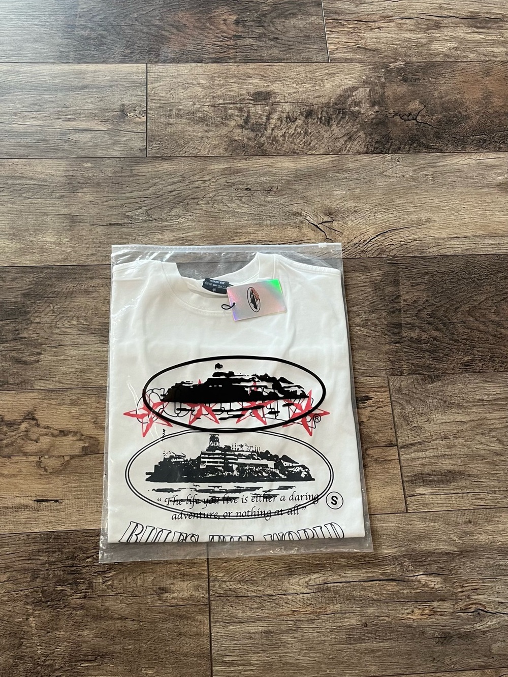 Corteiz RTW White Graphic Short Sleeve Tee with Black & Red Print
